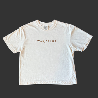 White t-shirt with 'WARPAINT' text on a white background